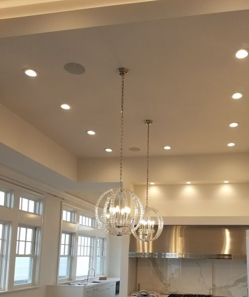 Cohassett Residence 3 Experienced RALCO Electric technician performing electrical service upgrades in a Massachusetts home, showcasing our commitment to modern and efficient residential electrical services