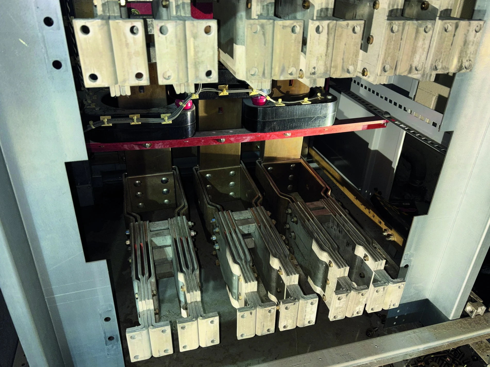Empty breaker cell showing copper bus connections